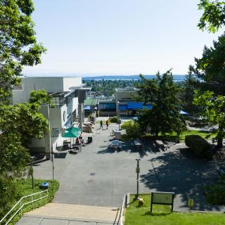 VIU Nanaimo campus aerial - view of library and quad and city beyond