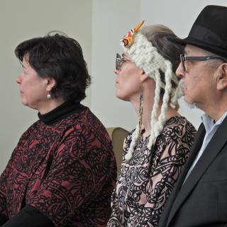 Dr. Deborah Saucier, VIU President, Aunalee Boyd-Good and her father, Ts’usquinuxn, William Good, who carved the Talking Stick