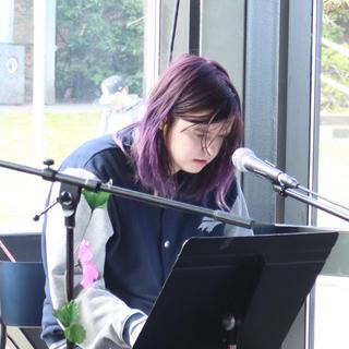 Ceridwen Nord does a dramatic reading during VIU's International Women's Day event.