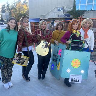 People dressed up as Josie and the Pussycats and Scooby-doo's crew