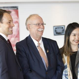 Adam Walker, MLA for Parksville-Qualicum, stands with Anne Kang, Minister of Advanced Education and Skills Training.