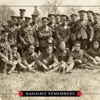 A group of soldiers pose for a photo with Nanaimo Remembers written across the bottom