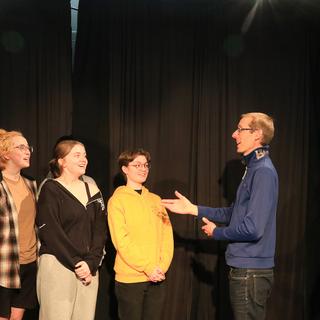 Actors from Our Town rehearse a scene.