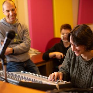 A VIU music student works on an audio recording device.