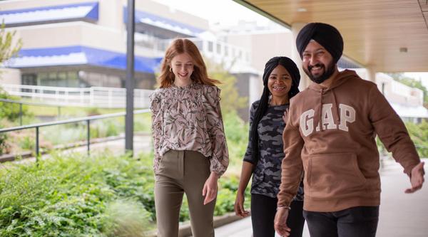 Three students walking on VIU's Nanaimo campus