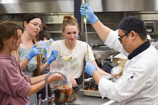 Four VIU microbiology and culinary arts work on their fermented seaweed products.