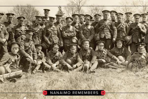 A group of soldiers pose for a photo with Nanaimo Remembers written across the bottom