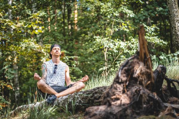 Man meditating in nature