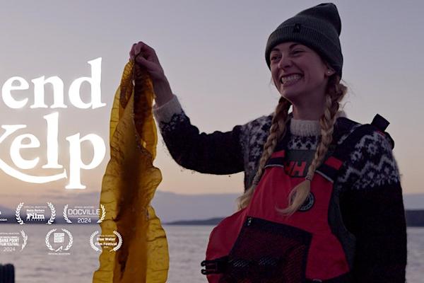 Frances Ward holds up seaweed and text across the image reads, Send Kelp