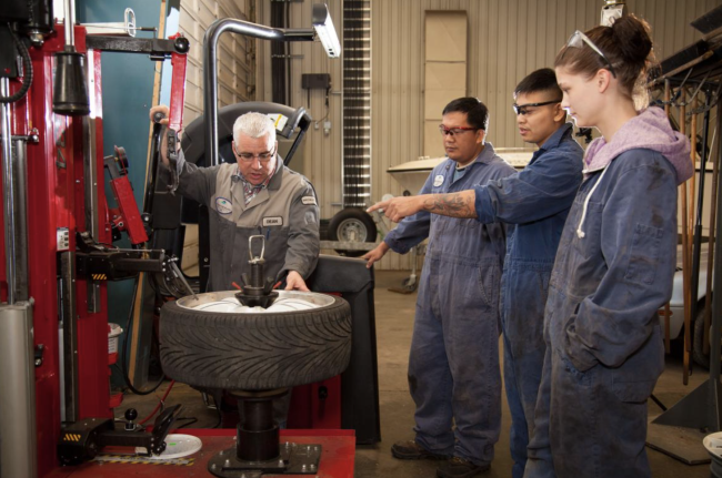 students in auto mechanics class