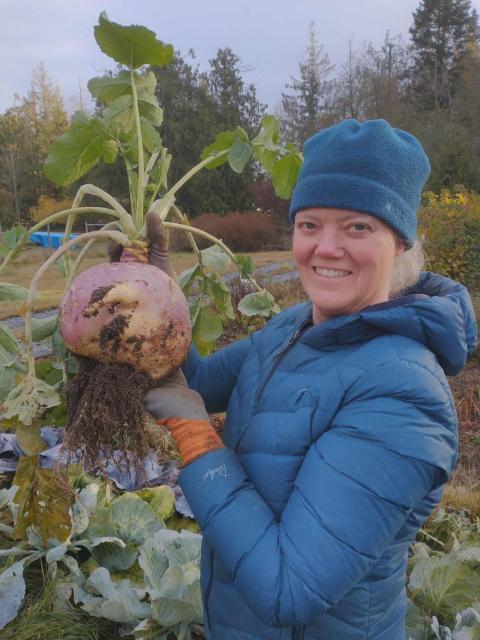 Toni holding a rutabaga